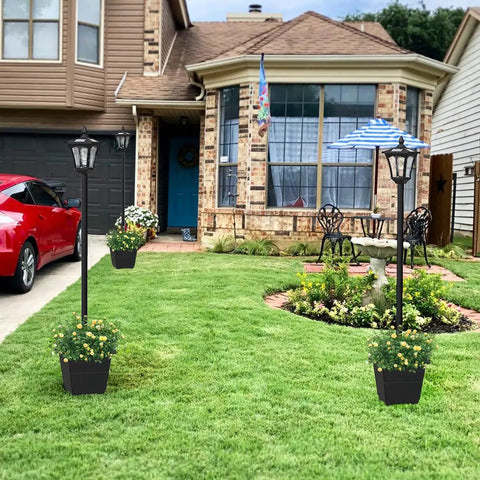 64 Inch Outdoor Solar Lamp Post With Planter 60 Lumen Waterproof Garden Path Driveway Light For Yard Front Back Door No Fuss Easy Install Solar Post Light All Weather Ready, installed in a front yard beside a red car, showing greenery in the planters.