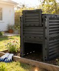 80 Gallon Outdoor Compost Bin With Top Flip Lid Includes Gloves Large Aerating Garden Box For Yard Waste Easy Exit Door BPA Free Material Black Turns Scraps Into Rich Compost Fast in garden setting