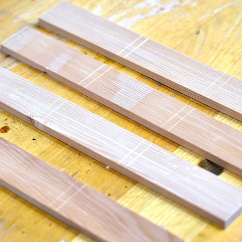 Wood pieces scribed with parallel lines using Woodworking Marking Gauge 4.75 Inch 120mm Adjustable Kebiki Japanese Scribe.