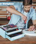 Man using Small But Mighty 12.5 Inch Metal Tool Box With Two Drawers, Open Top Storage, PVC Liners, Magnetic Tabs in workshop