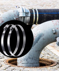 12 inch stainless steel hose clamps securing industrial pipes