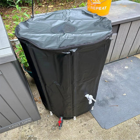 Heavy Duty Rain Barrel 1000L Storage Tank For Outdoor Use, Rugged Fabric Construction, Black Finish, on patio
