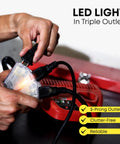 Hands plugging cords into Retractable Extension Cord Reel With 50 Ft Reach, 14 AWG, 3 Outlets, Ceiling Or Wall Mount