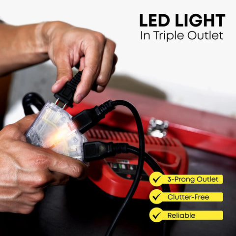 Hands plugging cords into Retractable Extension Cord Reel With 50 Ft Reach, 14 AWG, 3 Outlets, Ceiling Or Wall Mount