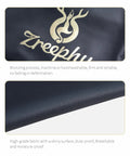 Close-up of Zreephy logo on piano keyboard dust cover, showing dark fabric texture with bronzing, dust-proof, breathable.