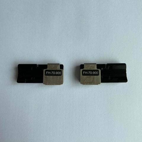 Two FH-70-900 Fiber Holder Fixture Jigs for FSM-70R 88R 90R Fusion Splicer, black, for 12-core ribbon clamps, front view.