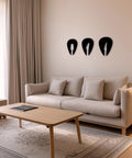 Set Of 3 Black Guitar Silhouette Wall Art On Engineered Wood 11x40 Inch Modern Wall Decor arranged above a couch in a living room