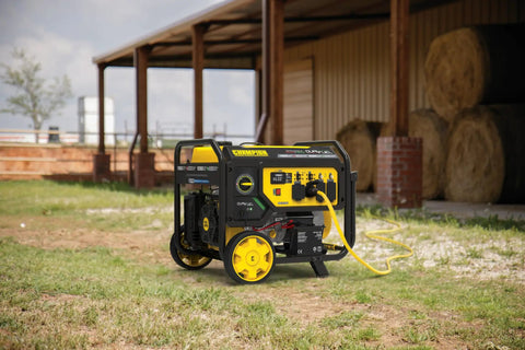 Beast 11500 Watt Dual Fuel Portable Generator with Electric Start for home backup, outdoors near a barn.