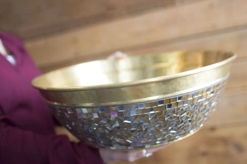 Person holding Round Solid Brass Vessel Sink With Hand Applied Champagne Glass Mosaics, 16 Inch, 14 Gauge Heavy Duty Construction
