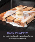 All-In-One Cutting Board Care Kit With Mineral Oil And Finishing Wax Includes Applicator Scrub Brush Buffing Pad And Lavender Rosemary Infused Wood Wax For Long Lasting Board Protection And Conditioning applied on wooden board