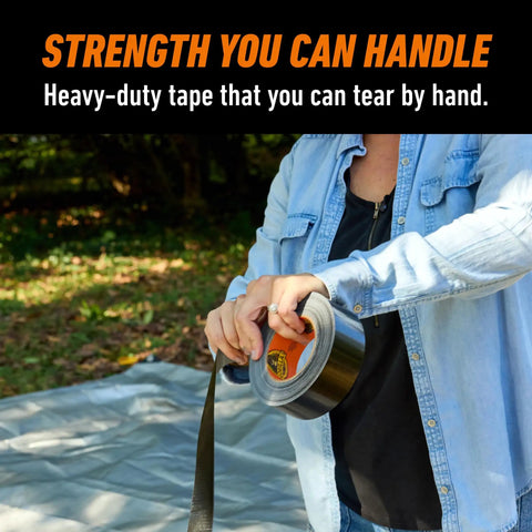 Person using Heavy Duty Black Duct Tape 1.88 Inch By 35 Yard Pack Of 2 Weather Resistant Indoor Outdoor Reinforced Backing for repair