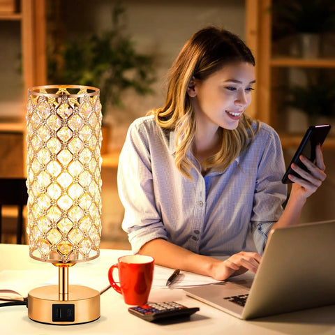 Touch Control Crystal Bedside Lamp With USB Ports, Dimmable 3 Way Gold Nightstand Light on desk with woman using phone