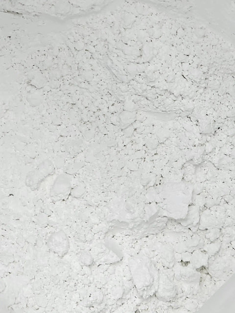 Close-up of lab grade silica powder SiO2 325 mesh 99 percent purity, fine crystal silica sand, used for coatings and casting projects.