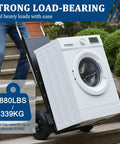 Electric Heavy Duty Beast Stair Climbing Dolly Cart With 1500 Watt Motor And 880 Pound Capacity moving a washing machine upstairs.