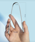 Hand holding Stainless Steel Tongue Scraper For Adults 2 Pack With Multicolor Travel Case, showing flexible and ergonomic design.