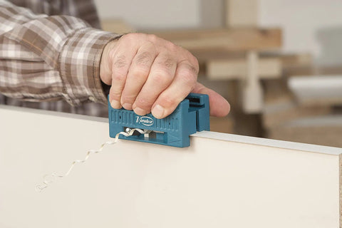 Person using AU93 Edge Banding Trimmer With Dual Edge Cutting And Scraper For PVC, ABS, Melamine And Veneer on wood laminate
