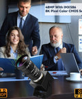 Top Tier 48MP USB Webcam Pumping Out Straight Fire 8K Ultra HD Video With 5 To 50MM 10X Manual Zoom Lens on a conference table.