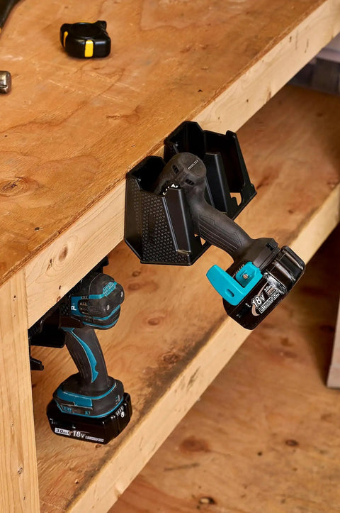Universal Drill Holder And Power Tool Organizer Wall Mount Rack For Cordless Drills And Drivers Two Way Fixation installed in workshop