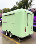 Turnkey mobile kitchen trailer in mint green, suitable for food truck hustle with plug and play electrical.