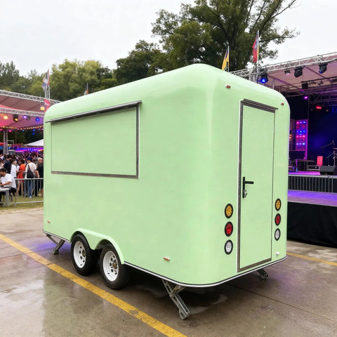 Turnkey mobile kitchen trailer in mint green, suitable for food truck hustle with plug and play electrical.
