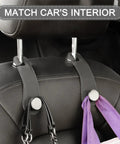 Badass Leather Car Headrest Hooks Two Pack Hella Sturdy Seat Storage Hangers For Bags And Groceries Top Shelf Ride Setup Gray mounted on headrest.