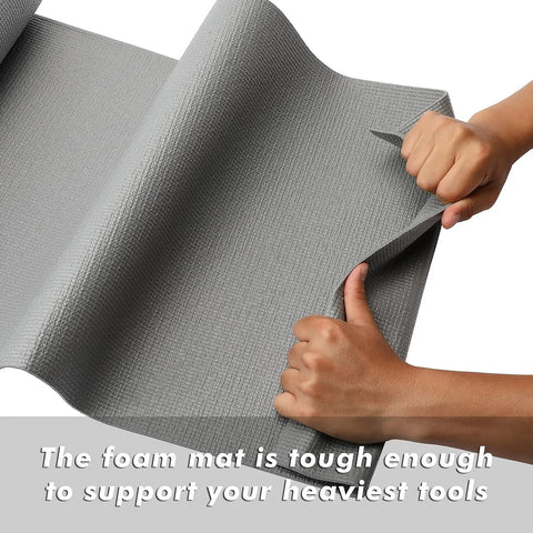 Professional Toolbox Drawer Liner Gray Non Slip Foam Rubber Mat With Easy Cut Grid Lines being held showing flexibility