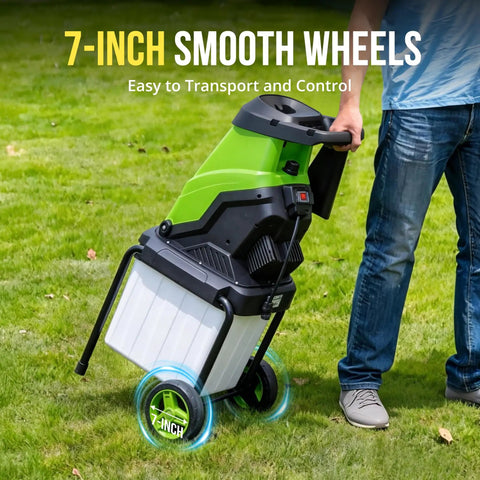 Man transporting Powerful Electric Wood Chipper Mulcher With 15 Amp Motor 1.8 Inch Cutting Diameter 50L Collection Bag