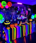 Decorated room for Halloween with 100W LED Black Light Bar For Neon Glow Parties And Fluorescent Art, bright UV effects on decor.