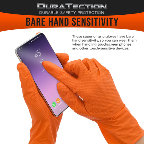 Premium 8 Mil Orange Nitrile Work Gloves Engineered With Diamond Texture For Rock Solid Grip And Top Shield Protection, set of gloves using touchscreen device.