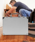 Slick Aluminum Alloy Toolcase Featuring Custom Foam Padding, Sweet Ride Hardshell Carry Box For Power Tools And Electronics Gear, Compact Travel Rig With Secure Latch on a wooden floor.