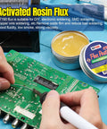 Person soldering PCB next to Rosin Solder Flux Paste For SMD BGA LED PCB IC CPU Electronic Repair And Soldering, 1.76 Oz 50 G