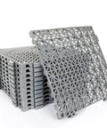 Stack of gray Interlocking Cushion PVC Flooring Tiles Set 12x12 Inches No Slip Drainage Mats For Pool Patio Bathroom Outdoor Indoor
