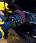 Scratch-X Car Scratch Remover used on glossy truck door to remove fine scratches and blemishes, showing quick fix application
