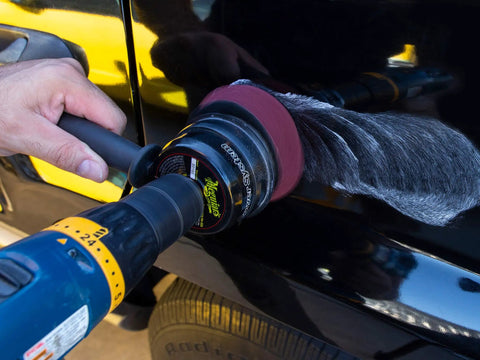 Scratch-X Car Scratch Remover used on glossy truck door to remove fine scratches and blemishes, showing quick fix application
