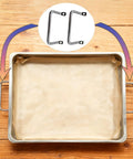 Straight Ahead Stainless Steel Tray Handles Set Of 4 With Comfy Angled Grip and Clean Silver look on a baking tray.