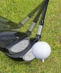 Golf club swinging with 300 Pack Golf Impact Tape For Woods Irons And Putters No Residue Swing Practice Stickers visible on clubface.