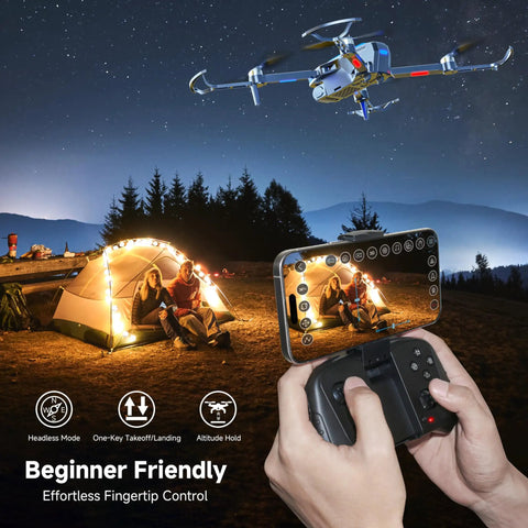 User controls 4K Camera Drone With FPV And Foldable Design For Adults And Kids at night with smartphone near campsite.
