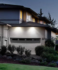 300W Equivalent Mini Corn Cob LED Light Bulb with E26 Base illuminating a home's exterior at night