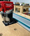 Solid As A Rock Guide Rail Adapter Plugs Right Into Milwaukee Router on MDF with aluminum track for clean dados and straight cuts.