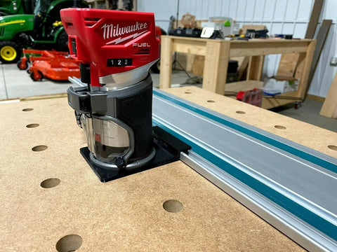 Solid As A Rock Guide Rail Adapter Plugs Right Into Milwaukee Router on MDF with aluminum track for clean dados and straight cuts.