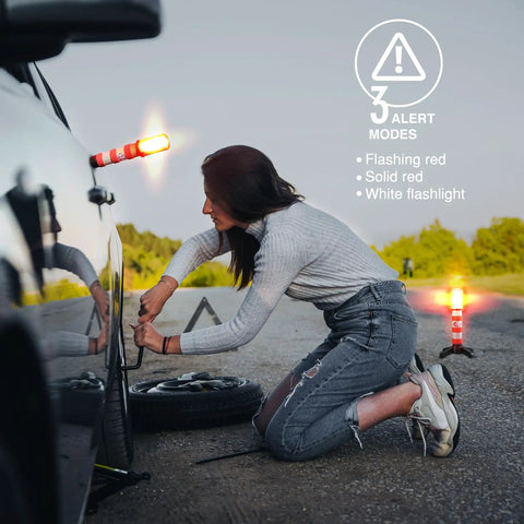 Woman changing tire by car with LED Road Flares For Vehicles With Three Alert Modes Flashing Red Solid Red And White Flashlight visible