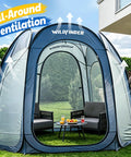 10x10 Pop Up Screen House Tent With Mesh Walls set up on lawn, furniture inside, all-around ventilation feature, for 4-6 people.