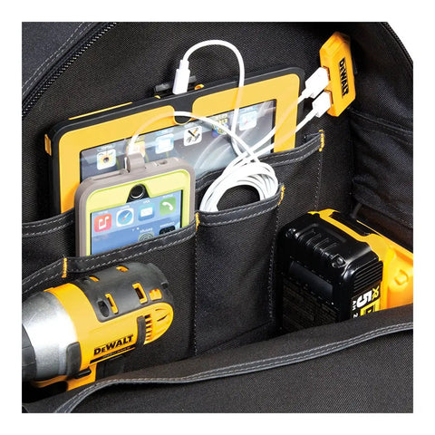 Interior view of DGC533 USB Charging Tool Backpack with 33 Pockets showing devices and tools, dual device USB charging visible.