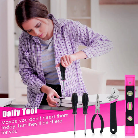 Woman using Pink 175 Piece 20V Cordless Drill Tool Set For Women with screwdriver, tool set displayed