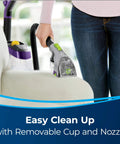 Person using 2-In-1 Pet Upholstery Tool For Carpet And Upholstery Cleaners Tackle Pet Hair, Stains, And Odors on couch