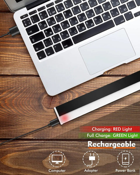 Charging Rechargeable Picture Light With Remote 4000mAh Battery 300 Lumen LED Art Light Bar beside laptop