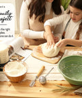 Family using All In One Sourdough Starter Kit With Pot 34 Oz Starter Jar 4 Banneton Baskets Scraper Scale and guide for homemade bread making