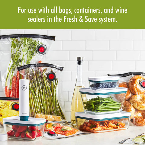 Fresh & Save La Mer Handheld Food Saver Vacuum Pump For Quick Sous Vide Sealing with vacuum-sealed foods and containers.