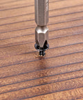Screwdriver inserting Two Hundred Fifty Black Number Eight By One Inch Half Wood Screws Bulk Box For Cabinet Joinery And Furniture Assembly Crafted From Premium Carbon Steel.