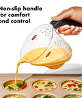 Hand using Angled 3 Piece Measuring Cup Set With Read From Above Design Liquid Measuring Cups For Easy Pouring And Quick Reads Ergonomic Kitchen Essentials For Baking And Cooking No More Bending Or Squinting